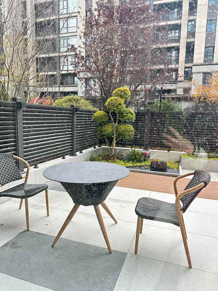 Courtyard tables and chairs on the first floor of the real estate